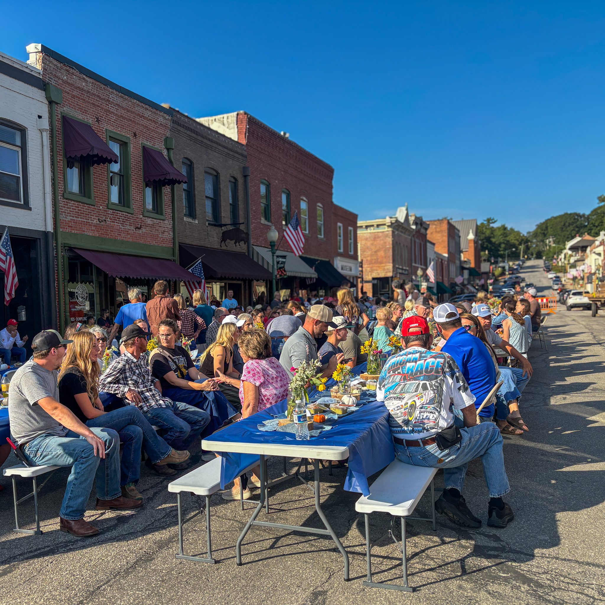 Photo by Megan Jantos
Guests fill tables along Main Street in downtown Weston during the West Platte FFA Harvest Dinner on Sunday, Sept. 13. The event drew 315 attendees.