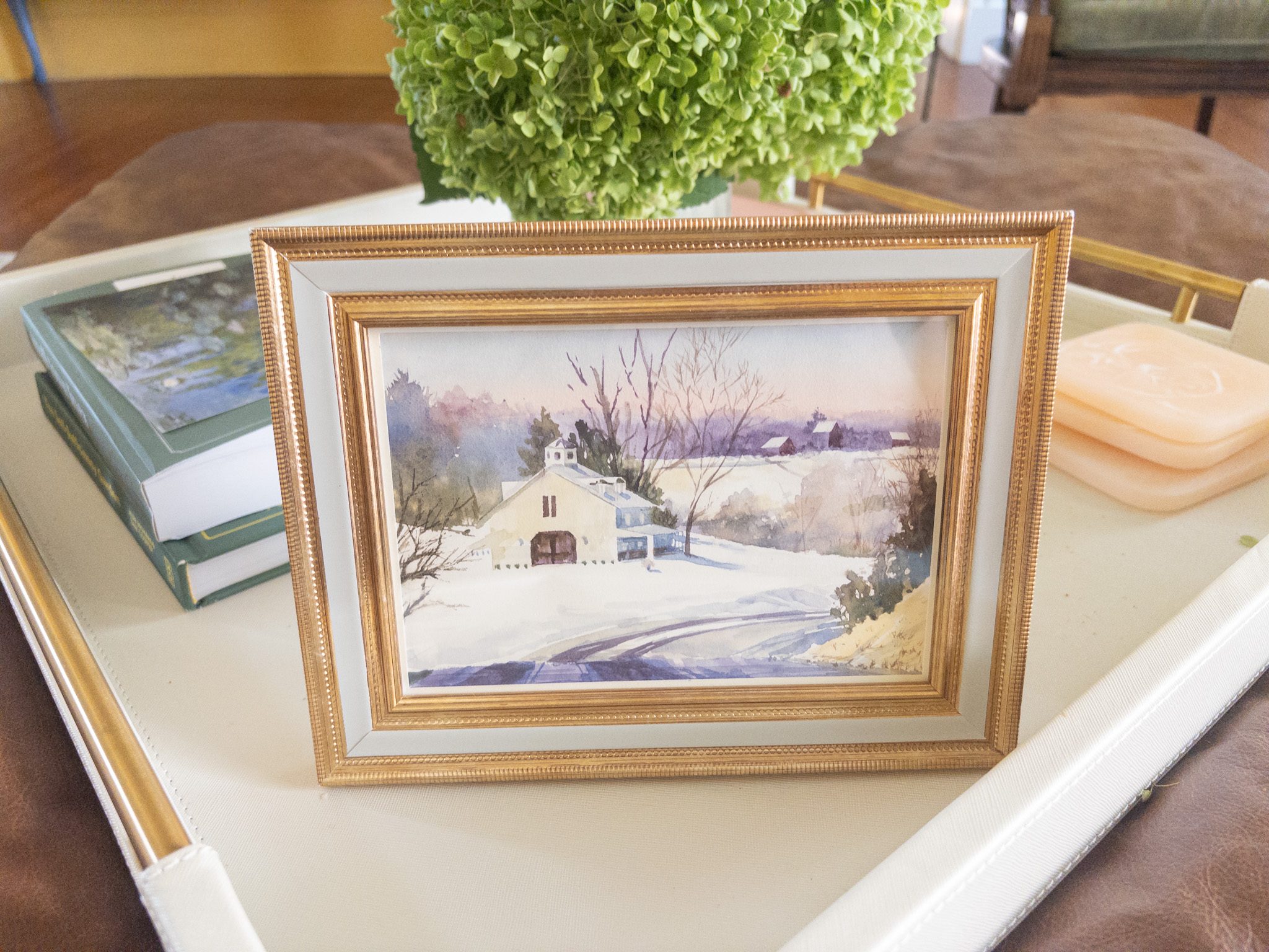 Photo by Megan Jantos
Rhonda McKinnon, author of “Drawn to Weston,” painted this watercolor depicting a snow-covered barn and winter landscape along her drive home.